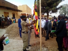 Hon Kyooma, Chair Happy and other leaders join in raising the flag to mark the beggining of Kanyarugiri Town Council