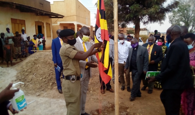 Hon Kyooma, Chair Happy and other leaders join in raising the flag to mark the beggining of Kanyarugiri Town Council